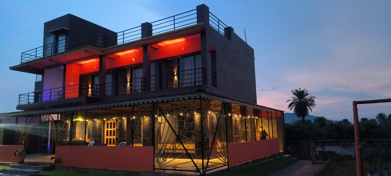 Aroma Resort at dusk with warm lighting